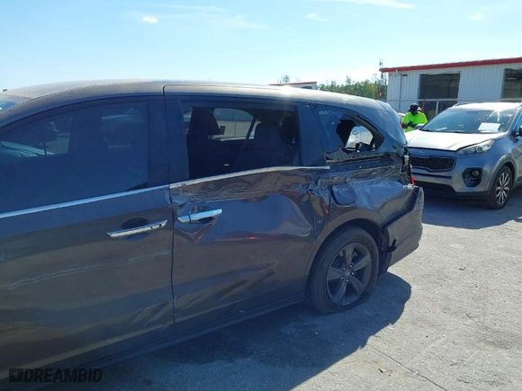 2021 Honda Odyssey EX with VIN 5FNRL6H59MB036990, listed as a IAAI auction lot 41452584 with NaN miles. Bid and sale history available at carsss.com. Image 6.
