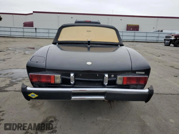 1975 FIAT 124 Spider z VIN 124CS10095845, wystawiony jako Copart lot #86344634 z przebiegiem 86 863 mil mil oraz Czysty tytuł • Clean title. Historia ofert i sprzedaży dostępna na DreamBid. Obrazek 6.