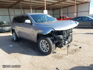 2021 Jeep Grand Cherokee Laredo X with VIN 1C4RJEAG2MC658386, listed as a IAAI auction lot 41218224 with 92,901 mi miles. Bid and sale history available at carsss.com. Image 1.