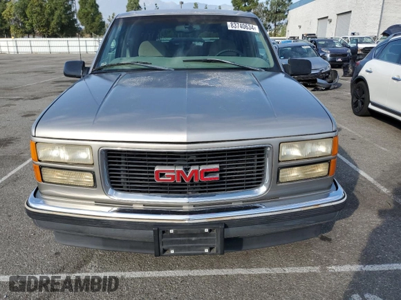 1999 GMC Suburban with VIN 3GKEC16R0XG526194, listed as a Copart auction lot 83740634 with 199,583 mi miles and Clean title. Bid and sale history available at DreamBid. Image 5.