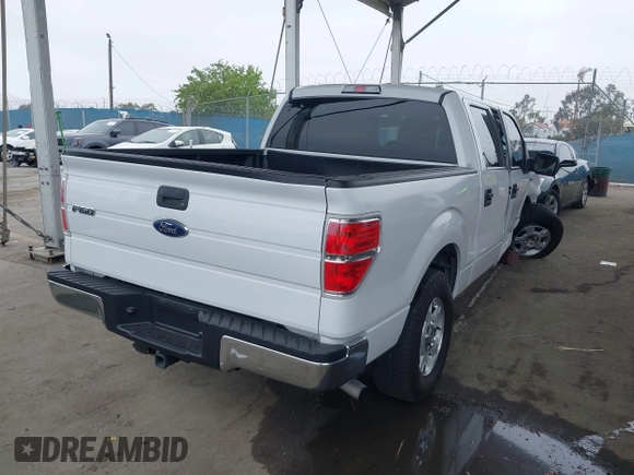 2014 Ford F-150 XL with VIN 1FTFW1CT1EKE22892, listed as a IAAI auction lot 42172851 with 14,203 mi miles and . Bid and sale history available at DreamBid. Image 4.