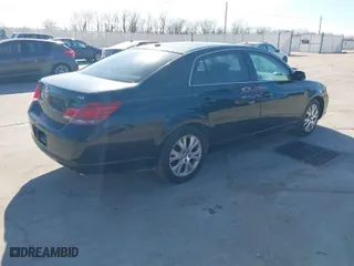 2009 Toyota Avalon XL with VIN 4T1BK36B89U335604, listed as a IAAI auction lot 41328877 with 166,396 mi miles. Bid and sale history available at carsss.com. Image 4.