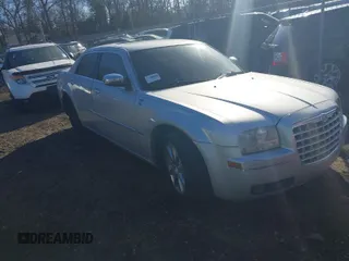 2010 Chrysler 300 Touring with VIN 2C3CA5CVXAH105998, listed as a IAAI auction lot 41698925 with 999,999 mi miles. Bid and sale history available at carsss.com. Image 1.