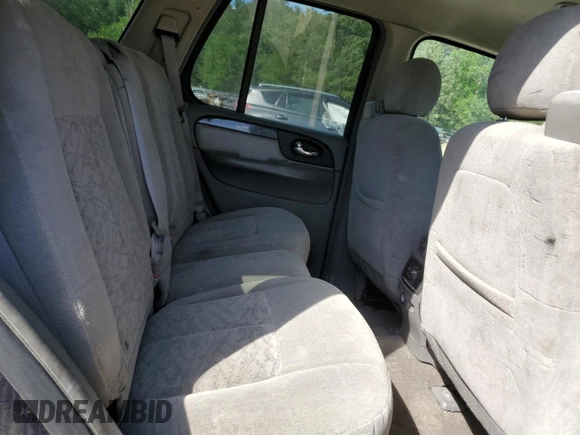 2007 GMC Envoy SLE z VIN 1GKDT13S672128192, wystawiony jako Copart lot #55395685 z przebiegiem 173 440 mil mil oraz Szkoda całkowita • Salvage title. Historia ofert i sprzedaży dostępna na DreamBid. Obrazek 11.