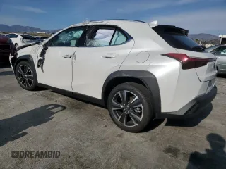 2025 Lexus UX with VIN JTHYBJAHXS2013108, listed as a Copart auction lot 45136895 with 1,350 mi miles and Salvage title. Bid and sale history available at DreamBid. Image 2.
