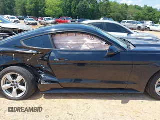 2017 Ford Mustang V6 z VIN 1FA6P8AM6H5342594, wystawiony jako IAAI lot #42479187 z przebiegiem 103 861 mil mil oraz . Historia ofert i sprzedaży dostępna na DreamBid. Obrazek 13.