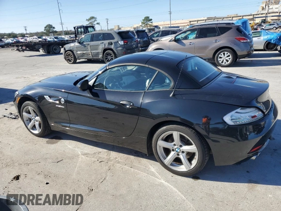 2015 BMW Z4 sDrive28i with VIN WBALL5C54FP557726, listed as a Copart auction lot 87249074 with 64,856 mi miles and Salvage Title. Bid and sale history available at carsss.com. Image 2.