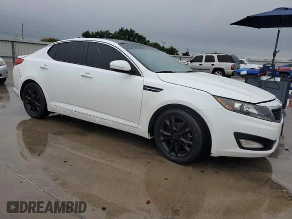 2013 Kia Optima EX z VIN 5XXGN4A75DG229393, wystawiony jako Copart lot #55855855 z przebiegiem 160 037 mil mil oraz Szkoda całkowita • Salvage title. Historia ofert i sprzedaży dostępna na DreamBid. Obrazek 4.