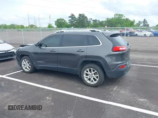 2015 Jeep Cherokee Latitude with VIN 1C4PJLCB5FW689811, listed as a IAAI auction lot 42113567 with 113,740 mi miles and . Bid and sale history available at carsss.com. Image 14.