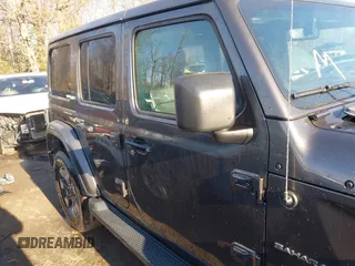2018 Jeep Wrangler Unlimited Sahara with VIN 1C4HJXEN5JW203879, listed as a IAAI auction lot 41131467 with 87,065 mi miles and . Bid and sale history available at DreamBid. Image 13.