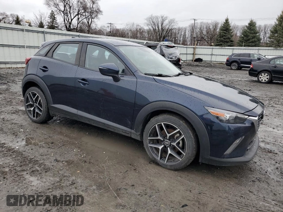 2017 Mazda CX-3 Touring with VIN JM1DKFC71H0164263, listed as a Copart auction lot 48951125 with 96,989 mi miles and Clean Title. Bid and sale history available at DreamBid. Image 4.
