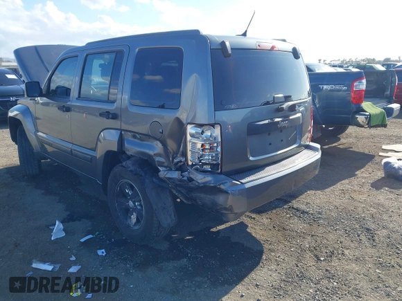 2012 Jeep Liberty Sport with VIN 1C4PJLAK2CW190883, listed as a IAAI auction lot 42066260 with 180,715 mi miles and . Bid and sale history available at carsss.com. Image 6.