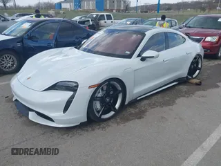2021 Porsche Taycan Turbo z VIN WP0AC2Y16MSA63752, wystawiony jako IAAI lot #41838152 z przebiegiem 17 304 mil mil oraz . Historia ofert i sprzedaży dostępna na DreamBid. Obrazek 2.