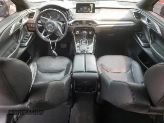 2017 Mazda CX-9 Grand Touring z VIN JM3TCADYXH0138805, wystawiony jako Copart lot #59201915 z przebiegiem 147 896 mil mil oraz Czysty tytuł • Clean title. Historia ofert i sprzedaży dostępna na DreamBid. Obrazek 8.