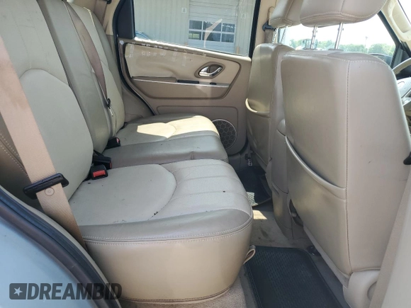 2005 Mercury Mariner Luxury z VIN 4M2YU57155DJ28005, wystawiony jako Copart lot #63460344 z przebiegiem 131 531 mil mil oraz Szkody całkowita. Historia ofert i sprzedaży dostępna na DreamBid. Obrazek 11.