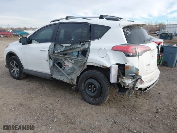 2018 Toyota RAV4 XLE with VIN 2T3RFREV2JW777906, listed as a IAAI auction lot 41164038 with 89,049 mi miles. Bid and sale history available at carsss.com. Image 3.