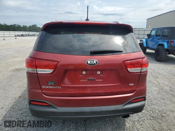 2017 Kia Sorento LX z VIN 5XYPG4A38HG237626, wystawiony jako Copart lot #57173035 z przebiegiem 141 417 mil mil oraz Szkoda całkowita • Salvage title. Historia ofert i sprzedaży dostępna na DreamBid. Obrazek 6.