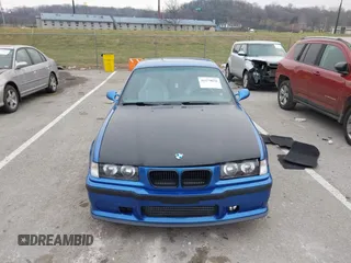 1999 BMW 3 Series M3 with VIN WBSBG9336XEY80979, listed as a IAAI auction lot 41179676 with 262,233 mi miles. Bid and sale history available at carsss.com. Image 12.