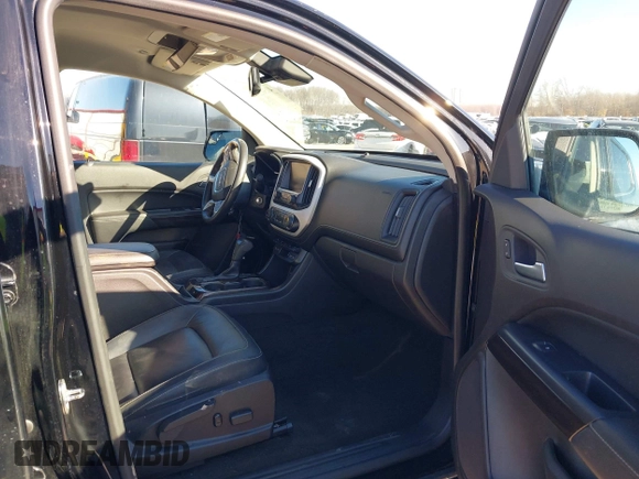 2015 GMC Canyon 4WD SLT z VIN 1GTG6CE33F1134747, wystawiony jako IAAI lot #41502300 z przebiegiem 143 027 mil mil oraz . Historia ofert i sprzedaży dostępna na DreamBid. Obrazek 5.
