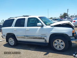 2002 GMC Yukon SLT z VIN 1GKEC13T62R189751, wystawiony jako IAAI lot #42228985 z przebiegiem 199 654 mil mil oraz . Historia ofert i sprzedaży dostępna na DreamBid. Obrazek 14.