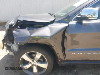 2015 Jeep Grand Cherokee Overland with VIN 1C4RJFCG7FC839778, listed as a IAAI auction lot 42490111 with 160,040 mi miles and . Bid and sale history available at DreamBid. Image 6.