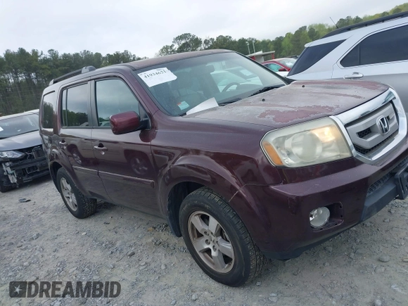 2011 Honda Pilot EX-L with VIN 5FNYF3H61BB050776, listed as a IAAI auction lot 41934621 with 172,424 mi miles and . Bid and sale history available at DreamBid. Image 13.
