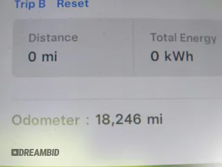 2020 Tesla Model Y Long Range with VIN 5YJYGDEE8LF057014, listed as a IAAI auction lot 41988113 with 18,246 mi miles and . Bid and sale history available at DreamBid. Image 16.