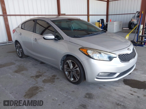 2016 Kia Forte EX with VIN KNAFX4A81G5528190, listed as a IAAI auction lot 42142075 with 162,056 mi miles. Bid and sale history available at carsss.com. Image 1.