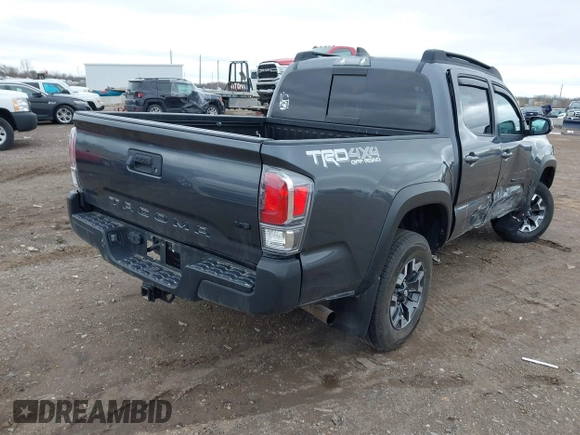 2021 Toyota Tacoma 4WD SR with VIN 3TMCZ5AN2MM406293, listed as a IAAI auction lot 41925585 with 52,243 mi miles. Bid and sale history available at carsss.com. Image 4.