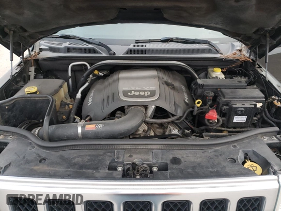 2007 Jeep Commander Overland with VIN 1J8HG68247C557731, listed as a Copart auction lot 87964795 with 174,195 mi miles and Salvage title. Bid and sale history available at DreamBid. Image 13.