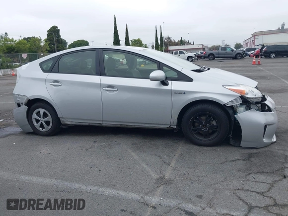 2015 Toyota Prius Four with VIN JTDKN3DU5F1931380, listed as a IAAI auction lot 42420445 with 128,596 mi miles and . Bid and sale history available at DreamBid. Image 14.