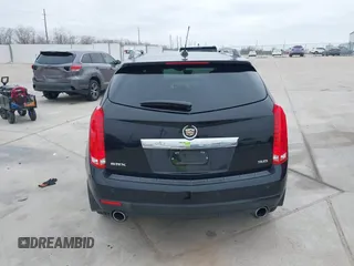 2015 Cadillac SRX Premium Collection z VIN 3GYFNDE3XFS576695, wystawiony jako IAAI lot #41612836 z przebiegiem Nie podano mil oraz . Historia ofert i sprzedaży dostępna na DreamBid. Obrazek 16.