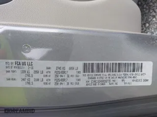 2016 Chrysler Town & Country Touring with VIN 2C4RC1BG4GR292735, listed as a IAAI auction lot 41931677 with 140,708 mi miles. Bid and sale history available at carsss.com. Image 9.
