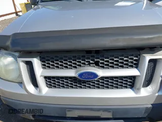 2003 Ford Explorer Sport Trac XLS z VIN 1FMZU77E63UA25807, wystawiony jako IAAI lot #42104625 z przebiegiem 230 608 mil mil oraz . Historia ofert i sprzedaży dostępna na DreamBid. Obrazek 6.