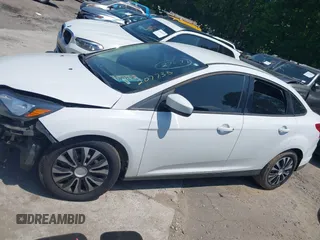 2012 Ford Focus SE with VIN 1FAHP3F24CL207735, listed as a IAAI auction lot 42131828 with 170,044 mi miles and . Bid and sale history available at DreamBid. Image 14.