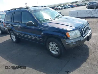 2004 Jeep Grand Cherokee with VIN 1J4GX48J74C283123, listed as a IAAI auction lot 42477393 with 182,491 mi miles and . Bid and sale history available at DreamBid. Image 1.