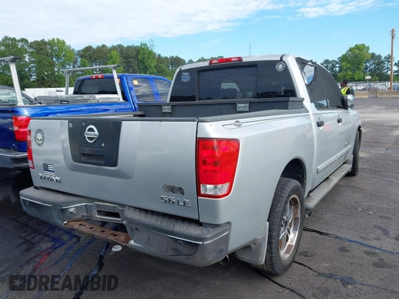 2005 Nissan Titan XE with VIN 1N6AA07A95N511746, listed as a IAAI auction lot 42190947 with 216,306 mi miles and . Bid and sale history available at DreamBid. Image 4.