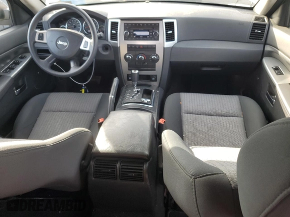 2009 Jeep Grand Cherokee Laredo with VIN 1J8HR48P89C552691, listed as a Copart auction lot 82080964 with 100,876 mi miles and Salvage Title. Bid and sale history available at carsss.com. Image 8.