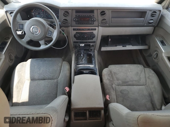 2006 Jeep Commander z VIN 1J8HG48K36C263515, wystawiony jako Copart lot #59080765 z przebiegiem 167 635 mil mil oraz Szkoda całkowita • Salvage title. Historia ofert i sprzedaży dostępna na DreamBid. Obrazek 8.
