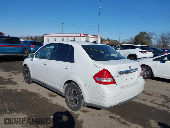 2009 Nissan Versa S with VIN 3N1BC11E19L394465, listed as a IAAI auction lot 41346553 with 159,983 mi miles and . Bid and sale history available at DreamBid. Image 3.