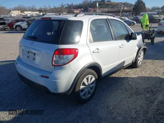 2013 Suzuki SX4 Crossover with VIN JS2YB5A39D6101193, listed as a IAAI auction lot 41675796 with 87,459 mi miles and . Bid and sale history available at DreamBid. Image 4.