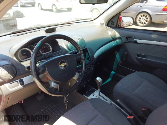 2011 Chevrolet Aveo 1LT z VIN KL1TD5DE0BB151956, wystawiony jako IAAI lot #42328720 z przebiegiem 115 765 mil mil oraz . Historia ofert i sprzedaży dostępna na DreamBid. Obrazek 5.