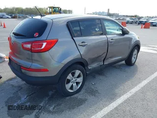 2013 Kia Sportage LX with VIN KNDPB3A24D7365157, listed as a IAAI auction lot 41968652 with 137,055 mi miles and . Bid and sale history available at DreamBid. Image 4.