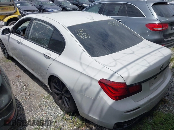 2014 BMW 7 Series ALPINA B7 with VIN WBAYE8C59ED135260, listed as a IAAI auction lot 41906238 with 152,030 mi miles. Bid and sale history available at carsss.com. Image 3.