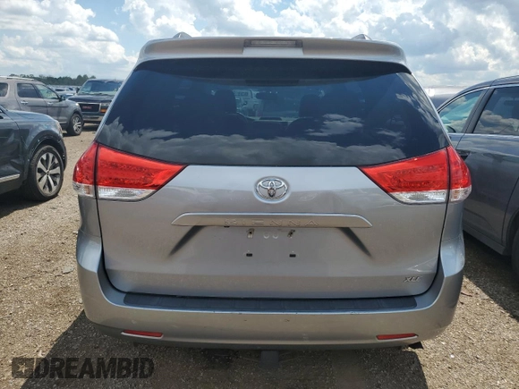 2011 Toyota Sienna XLE AAS с VIN 5TDYK3DCXBS169073, выставлен на аукционе Copart как лот 62084925 с пробегом 153 888 миль миль и Списание • Salvage title. История ставок и продаж доступна на DreamBid. Изображение 6.