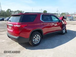 2021 Chevrolet Traverse LT Cloth with VIN 1GNEVGKW1MJ100973, listed as a IAAI auction lot 41477074 with 56,167 mi miles. Bid and sale history available at carsss.com. Image 4.