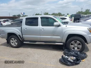 2009 Toyota Tacoma with VIN 3TMLU42N69M032320, listed as a IAAI auction lot 42280196 with 214,720 mi miles and . Bid and sale history available at DreamBid. Image 13.
