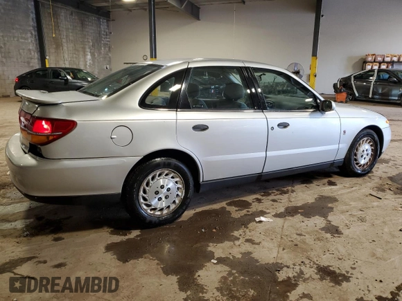 2002 Saturn LS z VIN 1G8JS54F32Y553699, wystawiony jako Copart lot #52019935 z przebiegiem 2513 mil mil oraz Szkody całkowita. Historia ofert i sprzedaży dostępna na DreamBid. Obrazek 3.