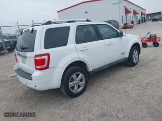 2008 Ford Escape Limited with VIN 1FMCU04168KE51420, listed as a IAAI auction lot 41435393 with 123,005 mi miles. Bid and sale history available at carsss.com. Image 4.