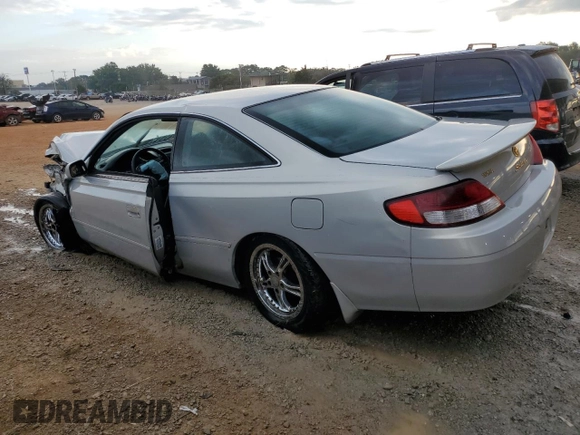 2000 Toyota Solara SE with VIN 2T1CG22PXYC398348, listed as a Copart auction lot 74207024 with 216,068 mi miles and Salvage Title. Bid and sale history available at DreamBid. Image 2.